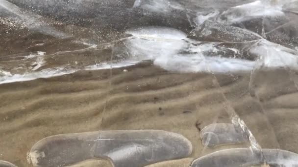 Sandy Bottom Lake Transparent Ice Air Bubbles — ストック動画