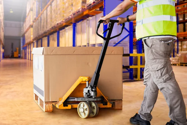 Workers Unloading Packaging Boxes on Pallets in Warehouse. Cartons Cardboard Boxes. Shipping Warehouse. Delivery. Shipment Goods. Supply Chain. Supplies Distribution Warehouse Logistics