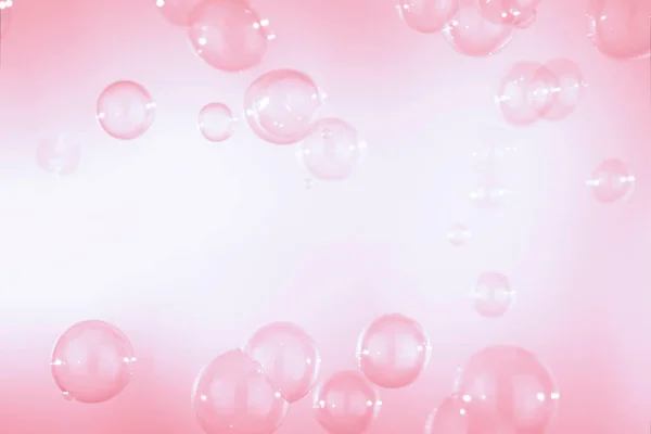 Beautiful Pink Soap Bubbles Abstract Background. Defocus, Blurred Celebration, Romantic Love ValentinesTheme. Circles Bubbles. Freshness Soap Sud Bubbles Water