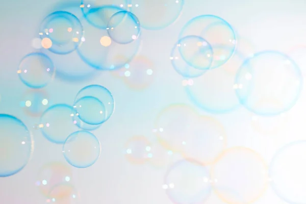 Beautiful Floating Colorful Soap Bubbles. Abstract Background. Soap Sud Bubbles Water.