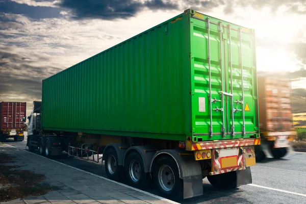 Shipping cargo Container, Semi Trailer Trucks Driving on The Road with The Sunset Sky. Commercial Truck, Delivery Express Transit. Lorry Tractor. Freight Trucks Logistics Cargo Transport