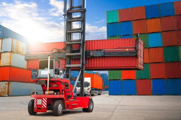 stock image Container Crane Tractor Lifting up Stacking Cargo Container. Handling of Logistics Transportation Industry. Cargo Container ships, Freight Trucks Import-Export. Distribution Warehouse Shipping.