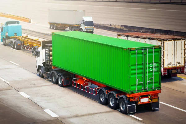 Semi Trailer Trucks Driving on Highway Road. Shipping Container Trucks. Commercial Trucks Transport. Delivery. Diesel Lorry Tractor. Freight Trucks Logistics Cargo Transport
