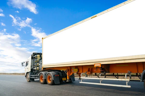 Semi Trailer Truck Driving on The Road. Shipping Container Blank Space For Advertising, Logo, Text. Commercial Truck Transport. Delivery Express. Diesel Trucks. Lorry Tractor. Freight Truck Logistic.