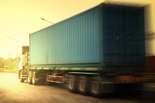 Speed Motion of Semi Trailer Truck Driving on The Road. Commercial Truck, Express Delivery Transit. Shipping Container Truck Transport. Freight Trucks Logistics Cargo Transport.