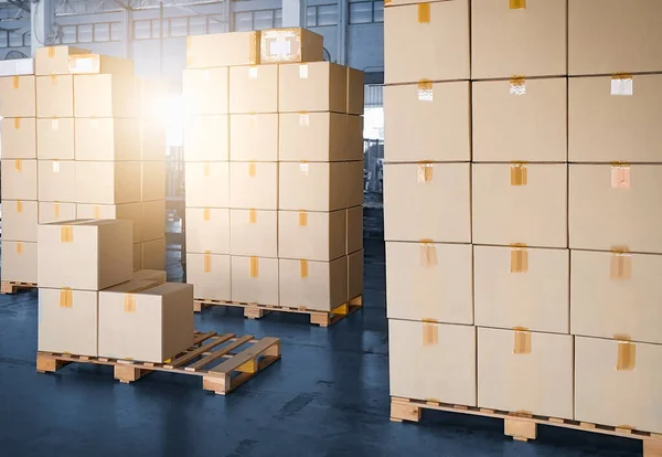 Package Boxes Stacked on Wooden Pallets in Warehouse. Cardboard Boxes, Parcels, Warehouse Shipping, Distribution Storehouse, Shipment Boxes, Supply Chain, Cargo Supplies Warehouse Shipping.
