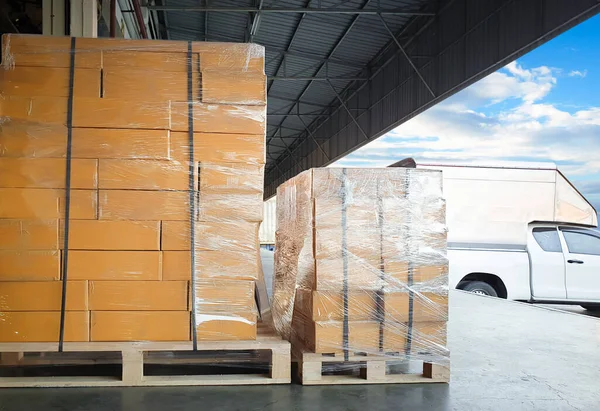 Package Boxes Wrapped Plastic Stacked on Pallets. Loading Truck at Warehouse Dock, Cargo Container, Distribution Supplies Shipping, Supply Chain, Shipment. Freight Truck Logistic Cargo Transport.