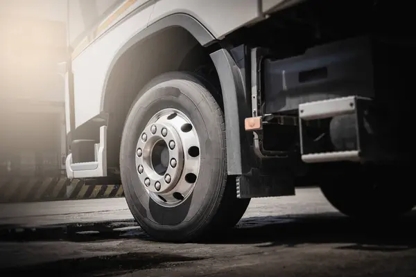 stock image Semi Trucks on The Parking Lot. Front Truck Wheels Tires. Trucking Shipping Cargo Trucks. Lorry Diesel Trucks. Freight Truck Logistics Transport