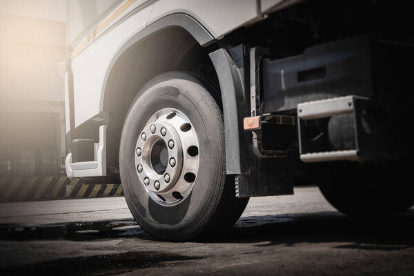 Semi Trucks on The Parking Lot. Front Truck Wheels Tires. Trucking Shipping Cargo Trucks. Lorry Diesel Trucks. Freight Truck Logistics Transport