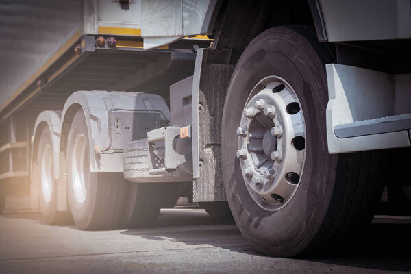 Semi Trucks on The Parking Lot. Truck Wheels Tires. Trucking Shipping Cargo Trucks. Lorry Diesel Trucks. Freight Truck Logistics Transport