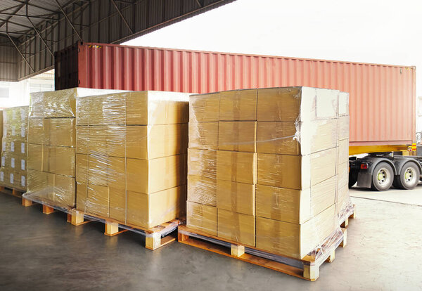 Package Boxes Wrapped Plastic Stacked on Pallets. Trucks Loading at Warehouse Dock. Cargo Container, Distribution Warehouse Shipping, Supply Chain Supplies, Shipment. Freight Truck Logistic Transport.