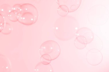 Güzel şeffaf pembe sabun köpükleri havada süzülüyor. Kutlama Şenliği Arkaplanı. Tazelik sabunu köpüklü su. Pembe ve Beyaz Dereceli.