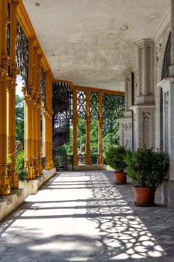 Summer terrace of famous Czech castle Hluboka nad Vltavou, medieval building with beautiful park