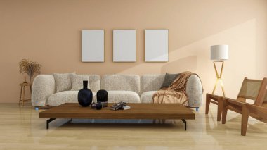 Sıcak nötr bir duvar, rahat bir bölmeli kanepe, alçak ahşap bir sehpa, iki baston sandalye, bir lamba ve üç boş çerçeve içeren modern bir oturma odası, rahat ve davetkar bir atmosfer yaratıyor..