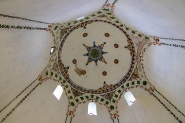 Obrochishte, Bulgaria - June 6, 2019: Ak Yazili Sultan Baba Dervish, tekke, a view from the interior dome the 16 century tomb of the muslim religious leader bektashi  clipart