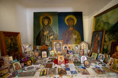 Obrochishte, Bulgaria - June 6, 2019: Ak Yazili Sultan Baba Dervish, an inside view the 16 century tomb of the muslim religious bektashi leader. There are christian symbols inside clipart