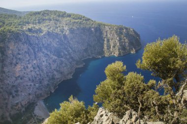 Kelebek Vadisi, kelebekler vadisi, Türkiye 'nin batısındaki Oludeniz / Fethiye ilinde. Bu vadiye sadece tekne ya da kaya tırmanışıyla ulaşabilirsiniz. Faralya, Türkiye. 