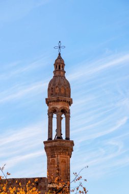 Bell tower of Midyat Mor Ahisnoya Church in Mardin, Turkey clipart