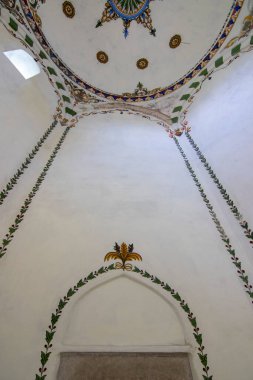 OBROCHISHTE, BULGARIA - JUNE 6, 2019: Ak Yazili Sultan Baba Dervish, tekke, an inside view the 16 century tomb of the muslim religious bektashi leader in Obrochishte, Bulgaria clipart