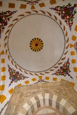 OBROCHISHTE, BULGARIA - JUNE 6, 2019: Ak Yazili Sultan Baba Dervish, tekke, an inside view the 16 century tomb of the muslim religious bektashi leader in Obrochishte, Bulgaria clipart