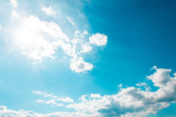 It is White Clouds on the blue sky with sun shines.