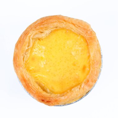 Bir yumurtalı tart ve beyaz teneke kutu..