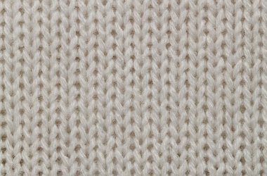 Desen ve arkaplan için beyaz örgü yün dokusudur..