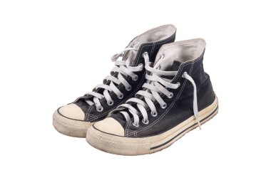 Beyazlar üzerinde izole edilmiş tuval ayakkabılar..