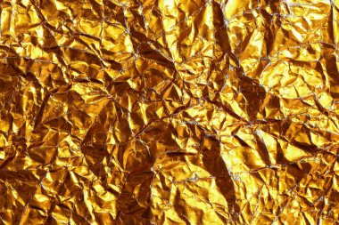 Kalıp ve arkaplan için kırışık altın folyo dokusudur..