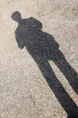 it is human shadow on floor.