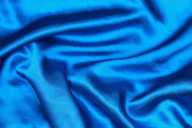 Desen ve arkaplan için mavi ipek üzerinde eğimli tasarım.