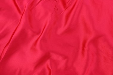 Arkaplan ve tasarım için zarif kırmızı ipek dokusudur..