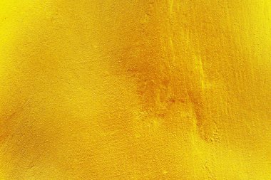 Desen ve arkaplan için çimento ve beton dokuya boyanmış altın.