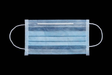 one new protective face mask isolated on black.