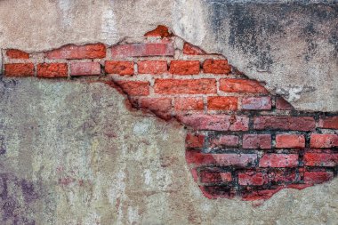 old brick wall with damaged concrete for background.