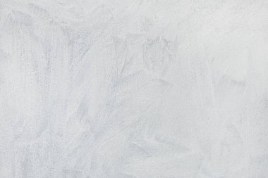 Desen ve arkaplan için beyaz boyanmış beton yapı.