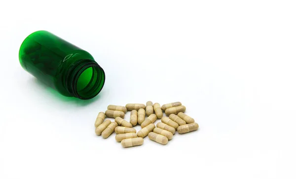 White Pills Spilling Pour Out Green Pill Bottle Isolated White — Stockfoto