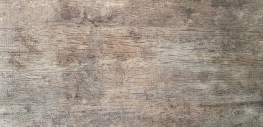 Açık kahverengi ahşap masa, arka plan için panel ve çerçeve. Duvar kağıdı ve yüzey gözlemi