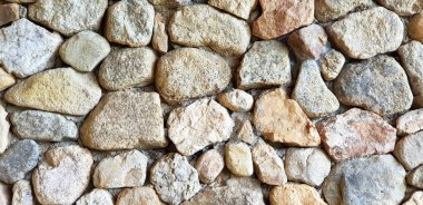 Arkaplan için renkli taş ya da kaya duvar. Soyut veya Sanat Duvar Kağıdı, Yüzey, Yer, Tasarım ve Dış Dekorasyon Konsepti. 