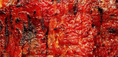 Arka plan için ızgara domuz eti ya da et yüzeyini kapatın. Sanat ve duvar kağıdı konsepti. Singapur 'da ünlü yemekler..