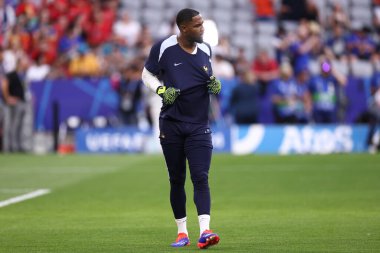Münih, Almanya. 9 Temmuz 2024. Uefa Euro 2024 'te Fransa ile İspanya arasında oynanan maçta Fransız Mike Maignan .