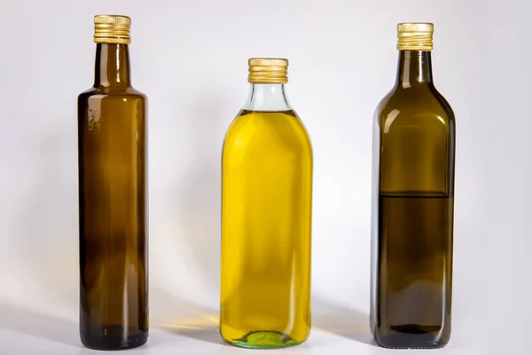 Trzy Różne Butelki Szklane Oliwą Zdjęcie Stockowe