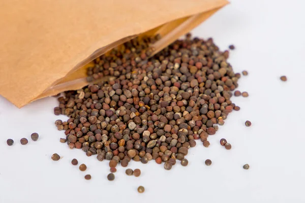 Cabbage seeds and packaging, selective focus.