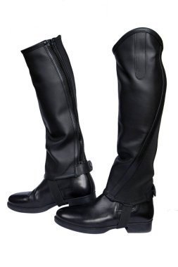 Special shoes for riding horses. Leather mini chap.