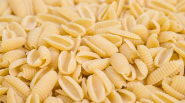 Pişmemiş İtalyan gnocchetti sardi makarna arkaplanını kapat.