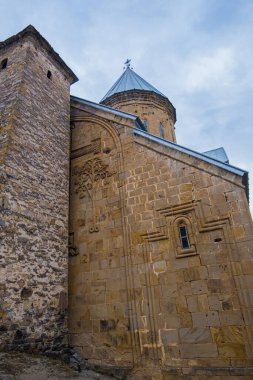 Ananuri, Georgia : 20-11-2022 : amazing view of the Ananuri castle complex with church on the Aragvi River in Georgia in a cloudy day. Ananuri Castle is located close Tbilisi.