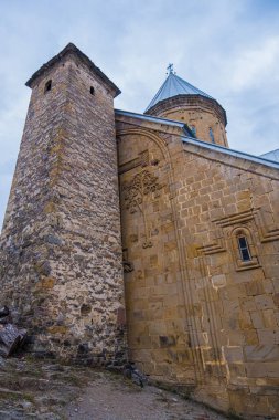 Ananuri, Georgia : 20-11-2022 : amazing view of the Ananuri castle complex with church on the Aragvi River in Georgia in a cloudy day. Ananuri Castle is located close Tbilisi.