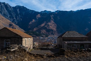 Kazbegi, Georgia : 10-11-2022 : Village Of Gergeti In Georgia, with the beautiful Caucasus mountain peaks and meadow surrounded .