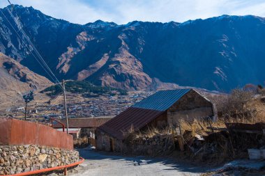 Kazbegi, Georgia : 10-11-2022 : Village Of Gergeti In Georgia, with the beautiful Caucasus mountain peaks and meadow surrounded .