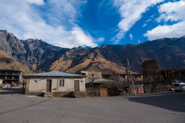 Kazbegi, Georgia : 10-11-2022 : Village Of Gergeti In Georgia, with the beautiful Caucasus mountain peaks and meadow surrounded .